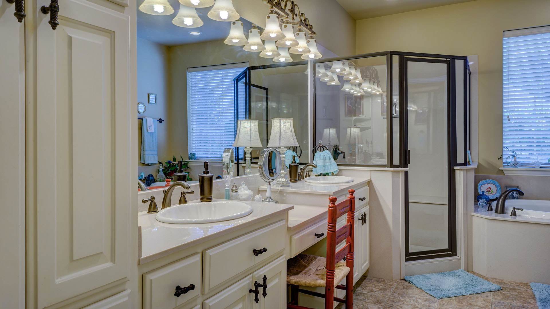 Luxury bathroom dresser with side handwash basins.