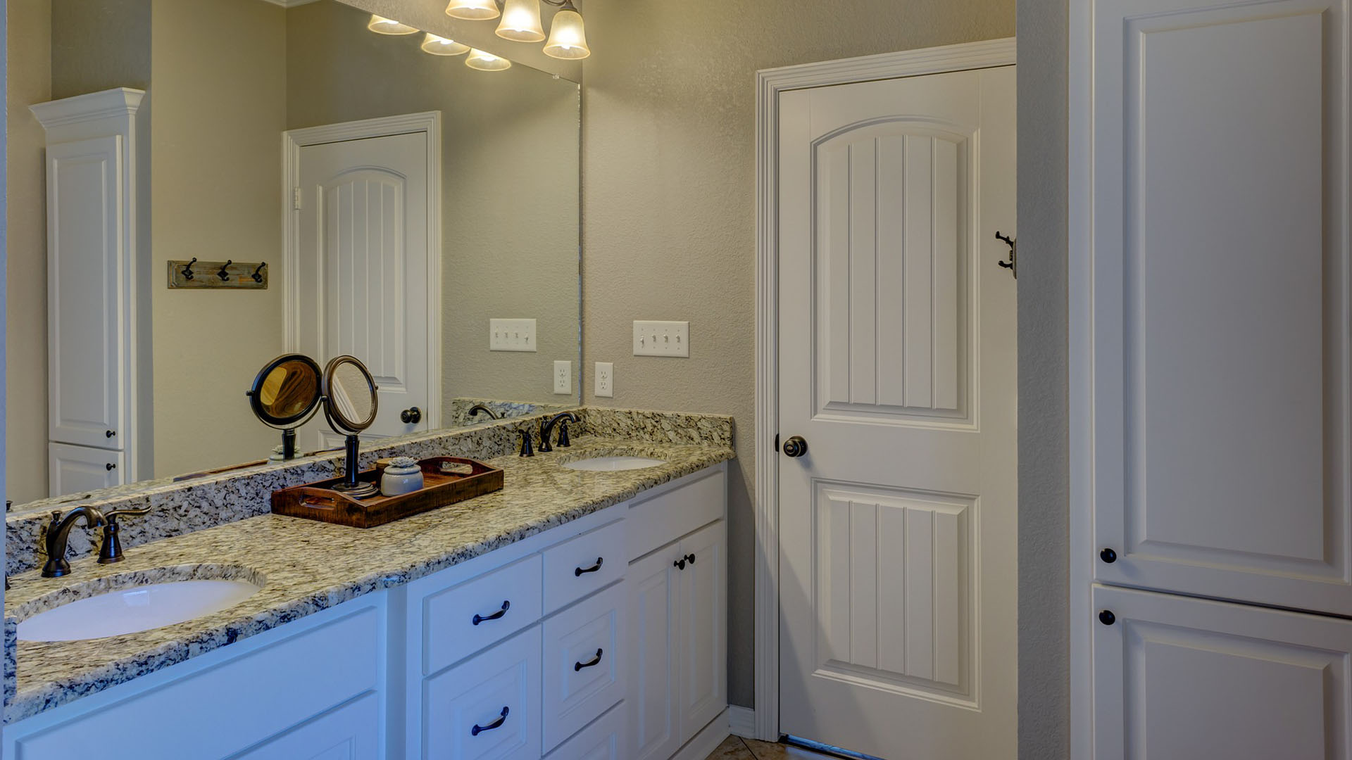 Granite top bathroom vanity.